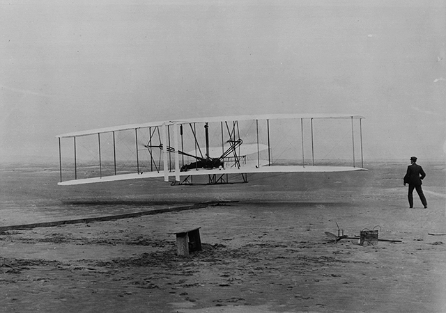 [640 x 450 photo (72 dpi) of Orville Wright's famous first airplane flight, 1903]